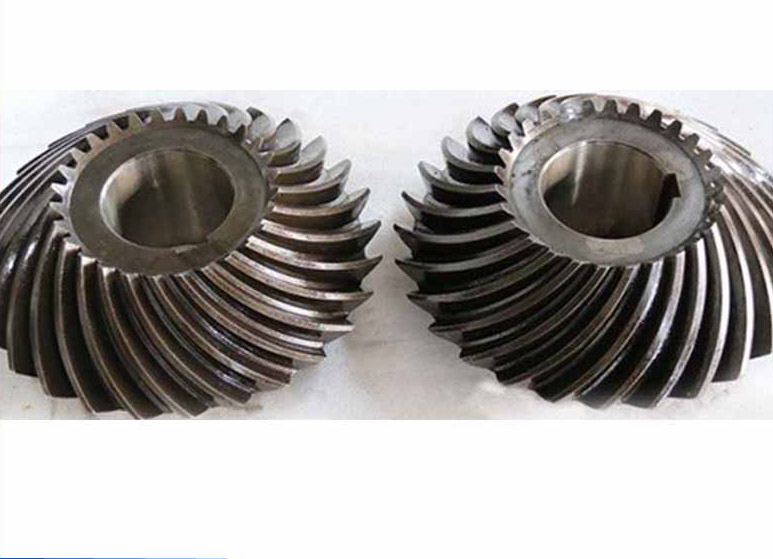 What is the difference between bevel gears and helical gears?